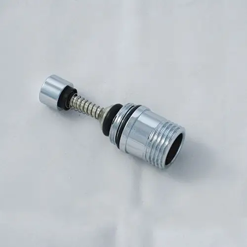 Kludi-Ersatzteil mit metallischer Oberfläche und Federmechanismus, geeignet für sanitäre Installationen zur Umstellung von Wasserströmen.